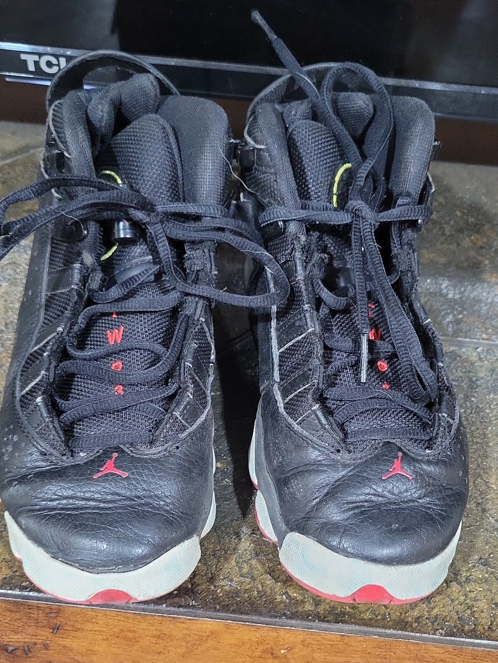 Jordan Men's Black Basketball Shoes with Red Accents